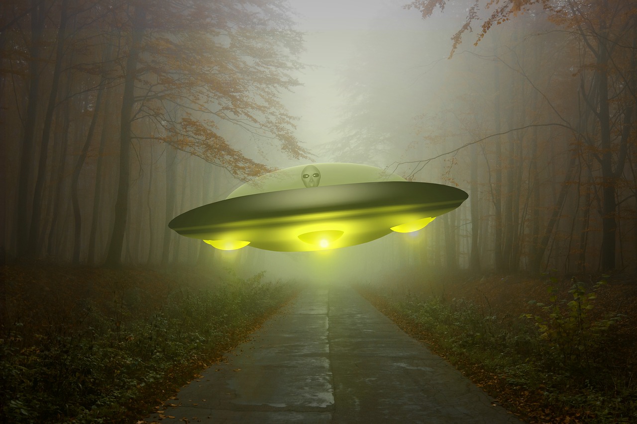 Contact Page image - alien in flying saucer